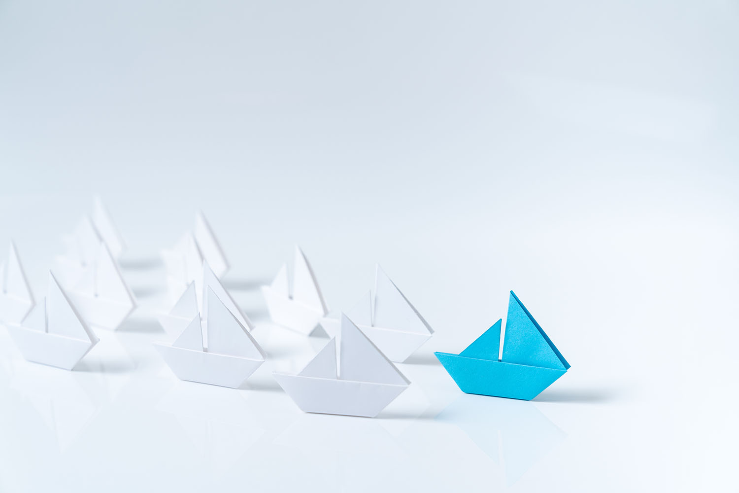 leadership-conceptual-using-blue-paper-ship-2023-11-27-05-09-41-utc@025x